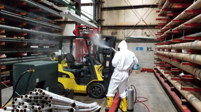 Disinfecting spray at an industrial facility in Bensenville, Illinois